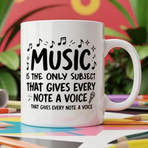 Ceramic coffee mug detail showing music theme print, perfect creative teacher gift cup.