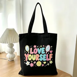 Borsa tote in tela nera con graziosa stampa grafica Love Yourself, spaziosa borsa a spalla.