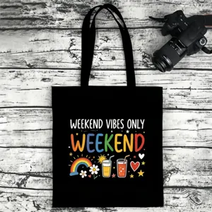 Black canvas tote bag with weekend vibes print, casual shoulder bag for daily use.