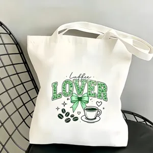 Sac cabas en toile blanche avec motif léopard café vert et nœud, parfait pour un usage quotidien.