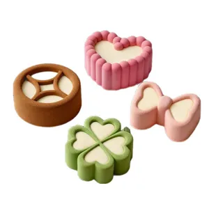 Silicone mousse cake mold set, 4 shapes including heart, clover, bow, and coin design.
