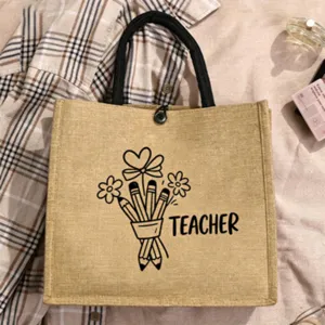Jute tote bag detail, teacher appreciation gift, simple pencil floral print, casual shopping bag.