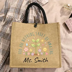 Personalisierte Jute-Tragetasche mit Blumenmuster und Wunschname, ideales Lehrergeschenk.