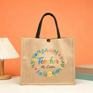 Detailed view of large jute tote bag featuring colorful floral teacher appreciation print.