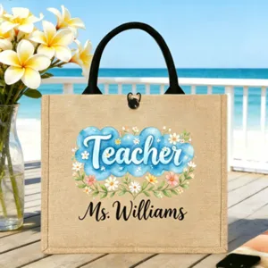 Jute-Tragetasche Detail mit individuellem Lehrer-Text und aquarellem Blumenmuster.