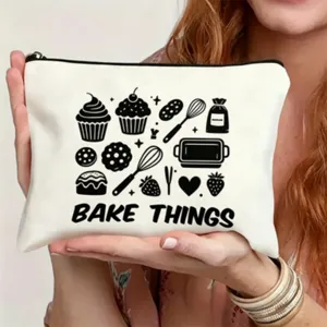 White canvas makeup pouch featuring cute baking graphics and black zipper for daily use.