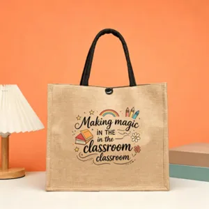 Detailed view of teacher jute tote bag with cute classroom print and black handles