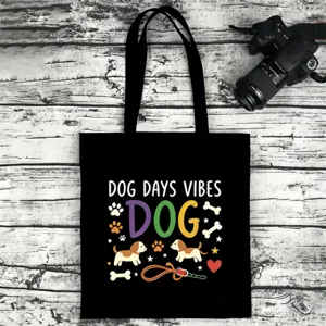 Black canvas tote bag with cute dog text print, casual shoulder bag for daily use.