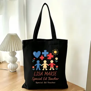 Personalisierte schwarze Segeltuchtasche für Lehrer der Sonderpädagogik mit Namen bedruckt.