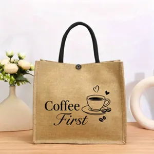 Detailansicht der Jutetasche mit Kaffeemotiv, stilvollem Aufdruck und stabilen schwarzen Griffen.