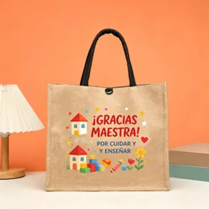 Detail shot of the Spanish teacher appreciation jute tote bag with colorful cartoon illustrations.