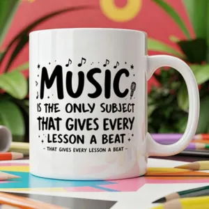Music teacher ceramic coffee mug detail view featuring inspirational quote and cute music notes print.