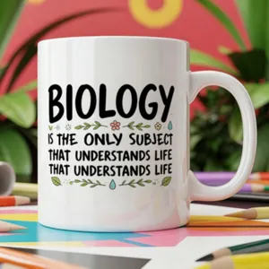 Detailed shot of a white ceramic coffee mug featuring funny science teacher biology typography.