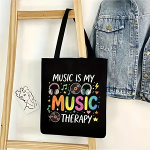 Bolso tote de lona negra vista detalle, estampado tema música, bolso de hombro casual diario.