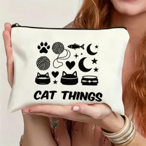 White canvas zipper pouch featuring cute black cat line art illustration and text.