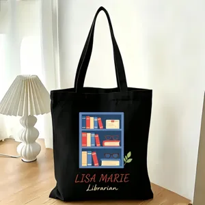 Schwarze Canvas Tragetasche mit individuellem Bücherregal Druck für den täglichen Weg.
