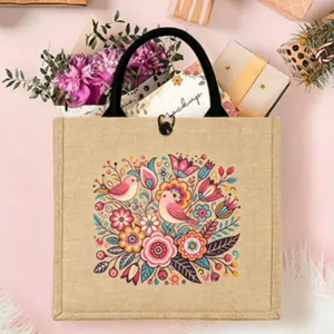 Nordic folk style jute tote bag with charming bird and floral print for daily shopping use.