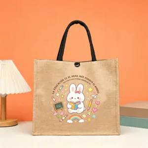 Burlap jute tote bag with cute cartoon rabbit reading design, perfect education teacher gift.