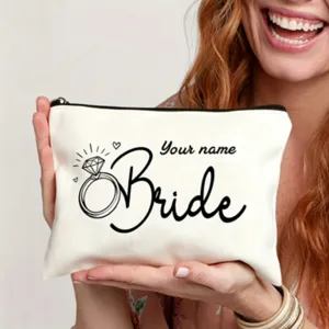 Custom bride makeup bag with ring print, white canvas zipper pouch for wedding party gifts.