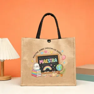 Detailed view of the teacher theme jute tote bag with colorful blackboard print and handles.