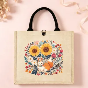 Nordic folk style jute tote bag with cute floral rabbit print, retro canvas handbag detail.
