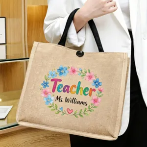 Burlap tote bag for teachers with colorful floral wreath and personalized text design for daily use.