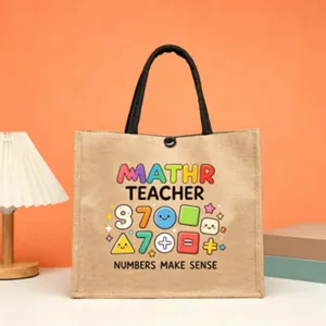 Cute math teacher jute tote bag with colorful cartoon numbers and rainbow letters pattern.