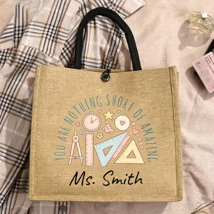 Personalisierte Jute-Tasche mit Lehrer-Aufdruck, robuste Tragetasche als Geschenk.
