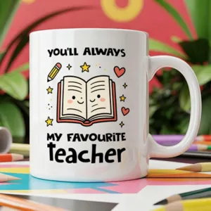 Ceramic coffee mug featuring cute book and teacher appreciation quote. Perfect gift for school.