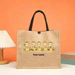 Customizable jute tote bag with cute cartoon giraffe print, sturdy handles, ideal daily handbag.