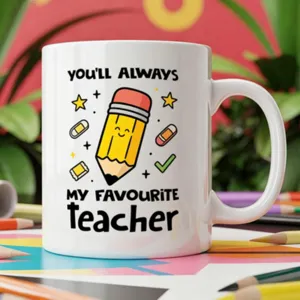 White ceramic coffee mug with cute cartoon pencil design, ideal teacher appreciation gift.