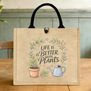 Detailansicht der Jute-Lunchtasche mit süßem Pflanzenprint und stabilen schwarzen Griffen.