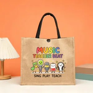 Cute music teacher jute tote bag with colorful letters and cute cartoon icons for daily use.