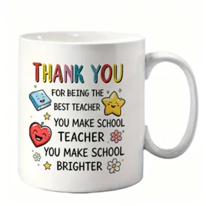 Tasse en céramique blanche pour professeur avec des éléments de dessins animés et citation.