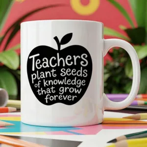 Detailed view of white ceramic coffee mug featuring inspirational teacher quote apple graphic.