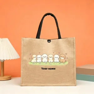 Custom jute tote bag detail featuring cute puppy graphic print and sturdy black handles.