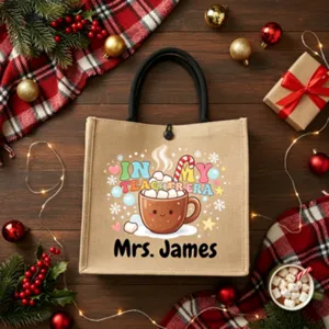 Custom jute tote bag with teacher theme and personalized name, perfect holiday gift.