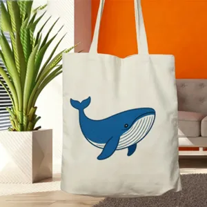 Borsa di tela con stampa di simpatica balena blu per il lavoro quotidiano e lo shopping.
