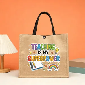 Detail shot showing the teacher theme graphic print on the durable jute tote bag surface.