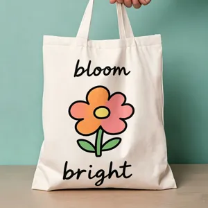 Detailansicht einer stilvollen weißen Canvas-Tragetasche mit schönem floralem Print.
