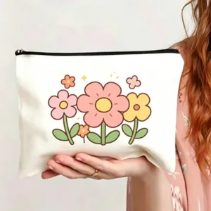 Leinwand Blumen Kosmetiktasche Detail zeigt niedliches Cartoon Blumenmuster und Reißverschluss.