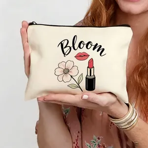 Trousse de maquillage élégante avec imprimé floral et rouge à lèvres, pochette portable voyage.