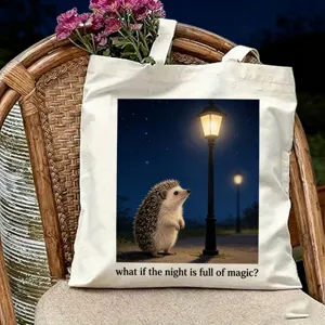 White canvas tote bag featuring cute hedgehog night scene print, perfect for daily travel.