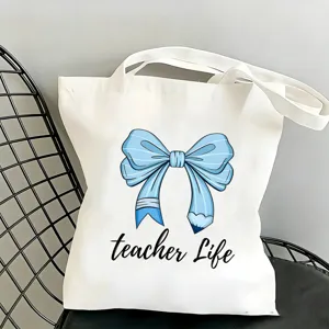 Borsa tote in tela bianca stampata alla moda con fiocco blu per uso quotidiano.