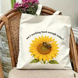 Canvas tote bag with cute sunflower bee print, casual shoulder bag for daily travel use.