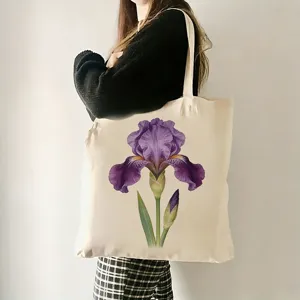 Nahaufnahme Detail der Canvas Tragetasche mit elegantem lila Irisblumen botanischem Druck.
