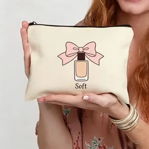 Trousse de maquillage en toile beige avec nœud mignon et parfum, pochette portable