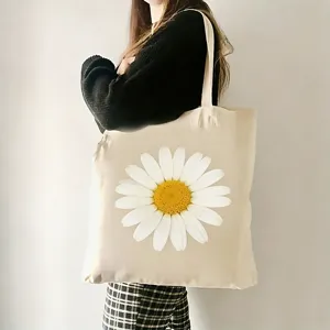 Detailansicht der beigen Segeltuchtasche mit großem weißen Gänseblümchen-Blumendruck-Design.