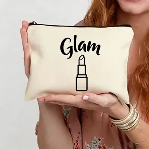 Trousse de maquillage en toile avec imprimé Glam et rouge à lèvres, idéale pour voyage et usage.