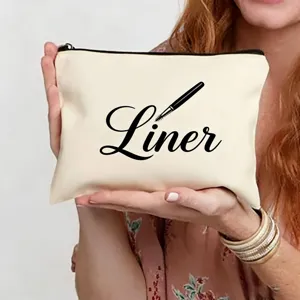 Trousse de maquillage en toile avec imprimé élégant, pochette portable pour voyage et quotidien.